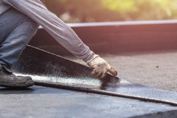Professional Basement Waterproofing technician working in Ardmore, AL